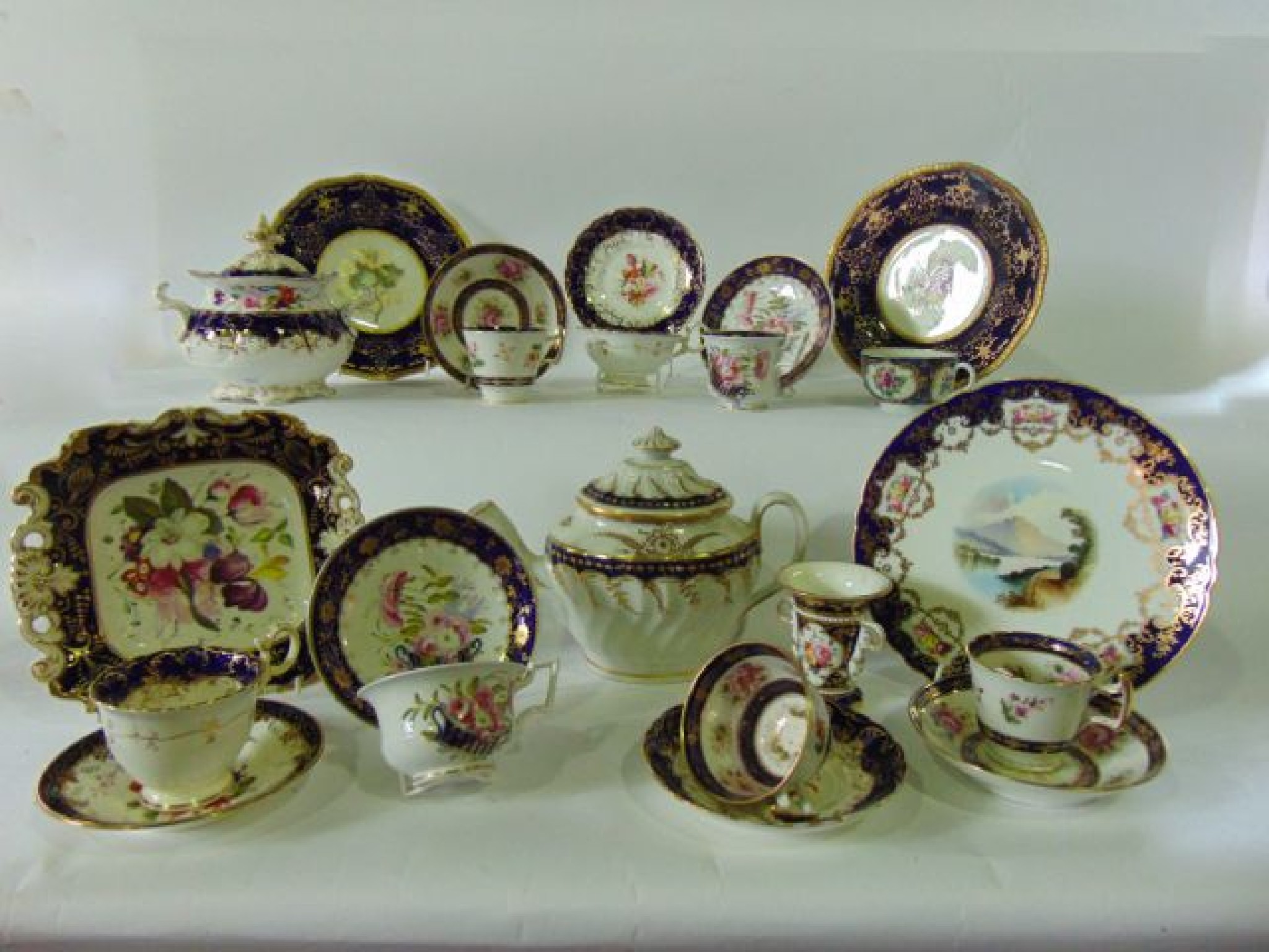 Appraisal: A collection of th century tea wares with painted floral