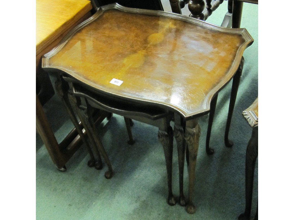 Appraisal: Walnut veneered nest of three tables