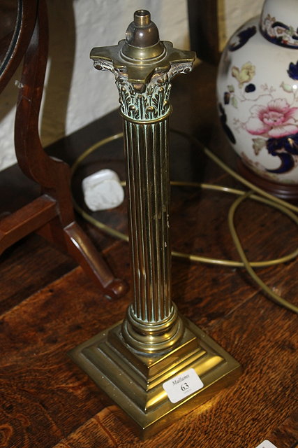 Appraisal: A VICTORIAN BRASS COLUMN LAMP BASE cm high