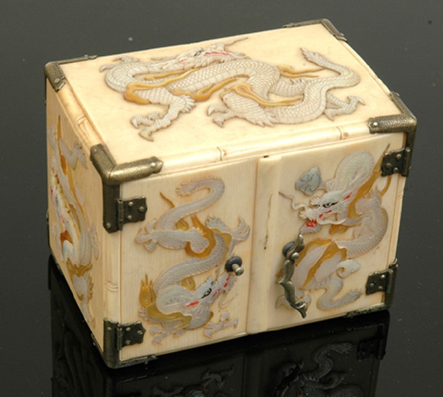 Appraisal: A MINIATURE JAPANESE IVORY AND SHIBAYAMA CABINET Meiji Period -