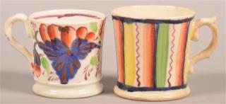 Appraisal: Two Gaudy Welsh Hard Paste China Child's Cups Both are