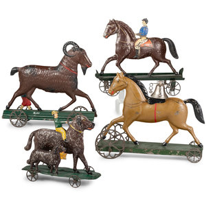 Appraisal: Four Pressed and Painted Tin Figural Pull Toys comprising a