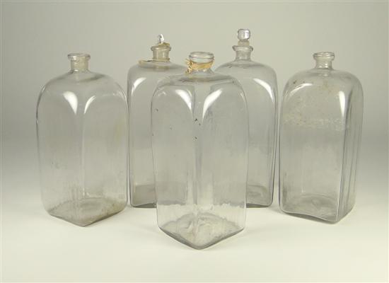 Appraisal: Five Blown Storage Bottles Early th Century Slightly ground pontil