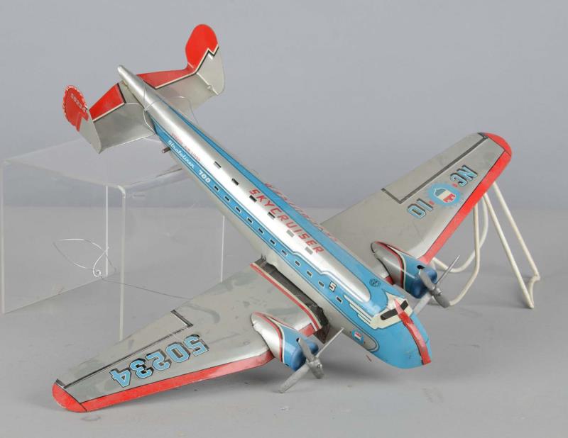 Appraisal: Marx Stratoliner Skycruiser Tin Litho Airplane This tin friction toy