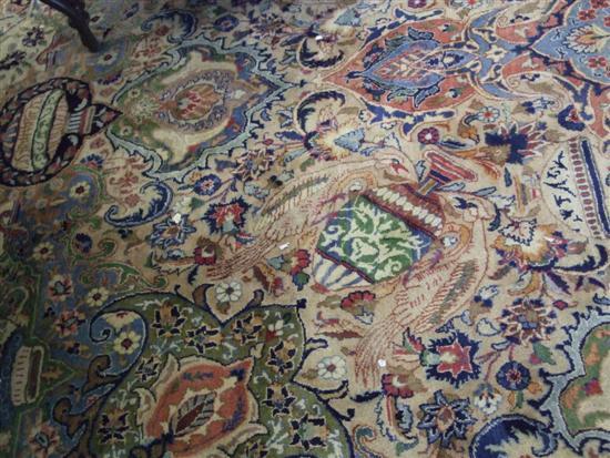 Appraisal: Persian cream ground carpet decorated with urns and swans