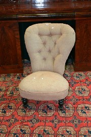 Appraisal: A Victorian mahogany and upholstered nursing chair