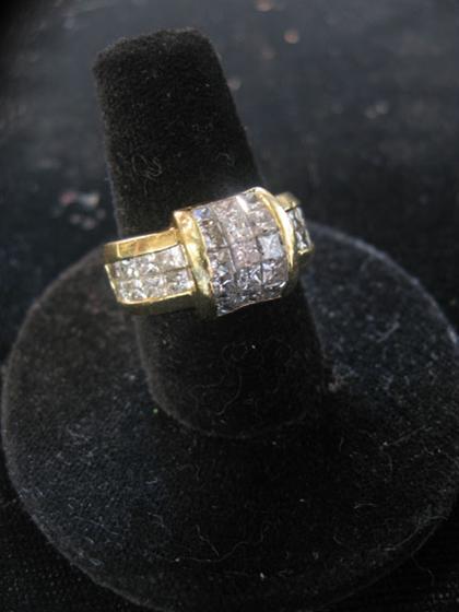 Appraisal: karat yellow gold diamond ring Contemporary knot form diamond ring