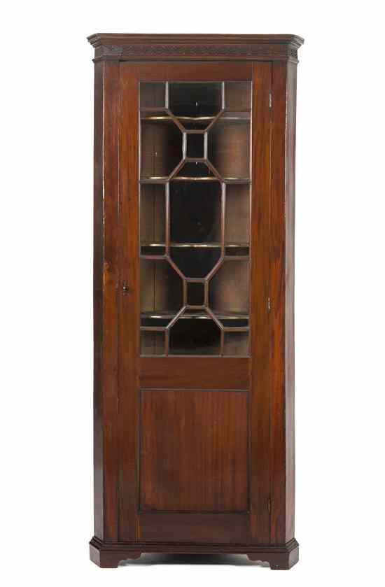 Appraisal: A Chippendale Style Mahogany Corner Cupboard having a plain cornice