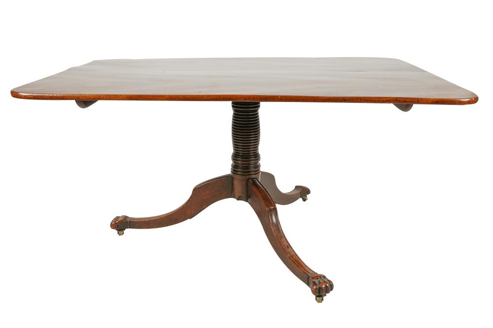 Appraisal: ANTIQUE GEORGIAN-STYLE MAHOGANY BREAKFAST TABLEthe two-board top on a turned