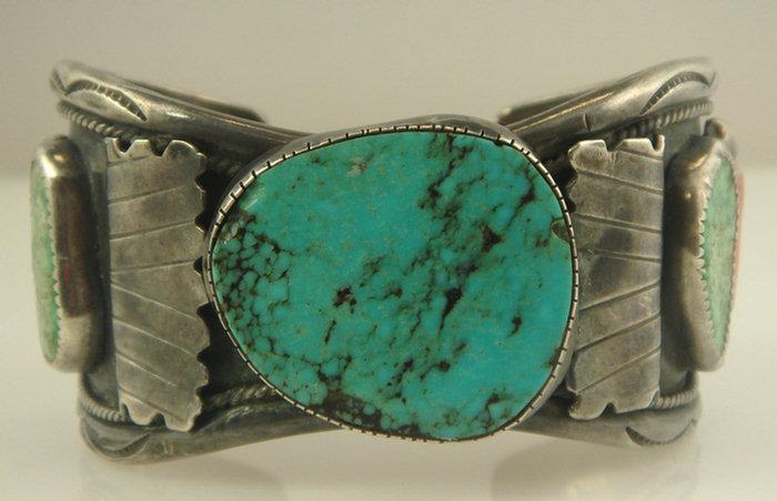 Appraisal: Native American silver turquoise and coral inlaid cuff bracelet signed