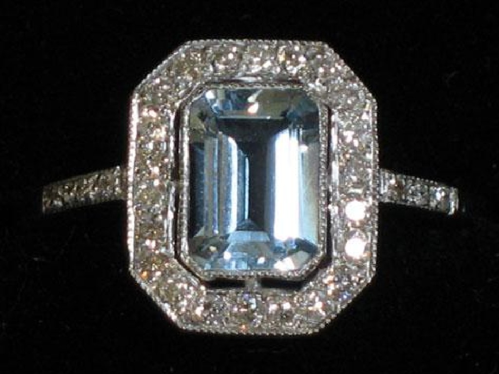 Appraisal: AN ART DECO DESIGN AQUAMARINE AND DIAMOND DRESS RING the