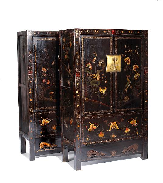 Appraisal: A pair of Chinese polychrome and black lacquered two door