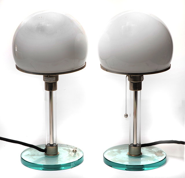 Appraisal: A PAIR OF CONTEMPORARY CONTINENTAL TABLE LAMPS with ovoid glass