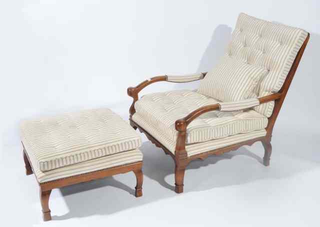 Appraisal: A CONTINENTAL PROBABLY AUSTRIAN LARGE OAK OPEN ARMCHAIR with matching