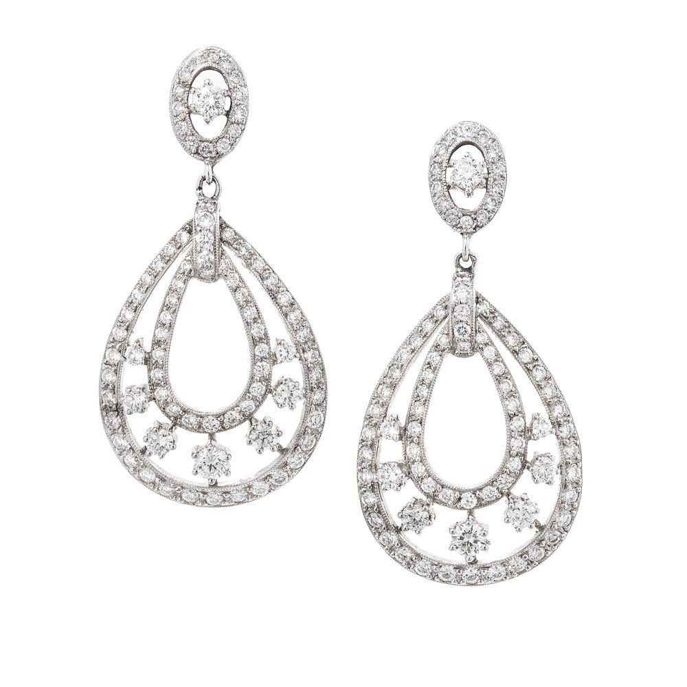 Appraisal: DIAMOND EARCLIPS DIAMOND EARCLIPS Containing round brilliant cut diamonds weighing