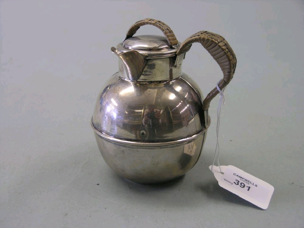 Appraisal: A silver hot milk jug complete with cover jug and