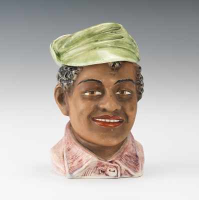 Appraisal: Majolica Black Boy Head Humidor Jar Ceramic with polychrome glazes