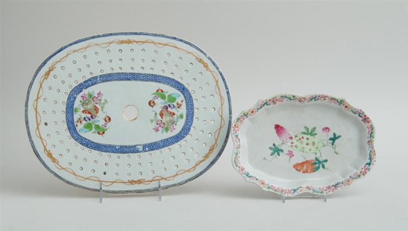 Appraisal: CHINESE EXPORT PORCELAIN FAMILLE ROSE DISH STRAINER Decorated with fruit