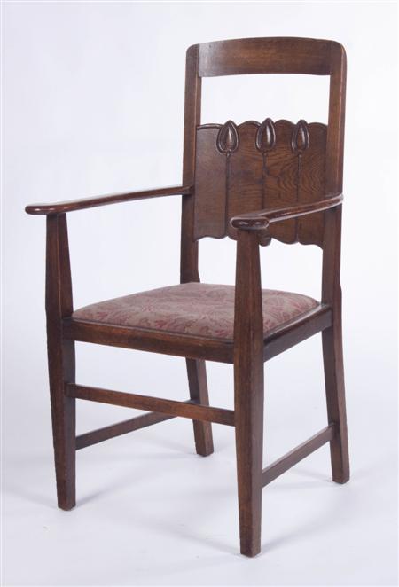 Appraisal: ARTS CRAFTS ARMCHAIR CIRCA oak the back carved with stylised