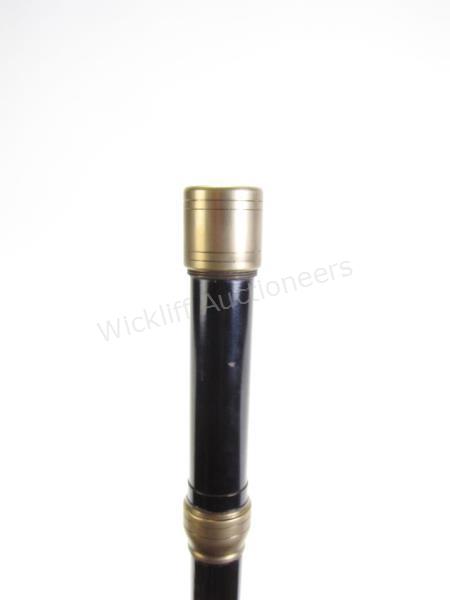 Appraisal: Captain's Cane segmented ebony shaft with brass collars shaft and