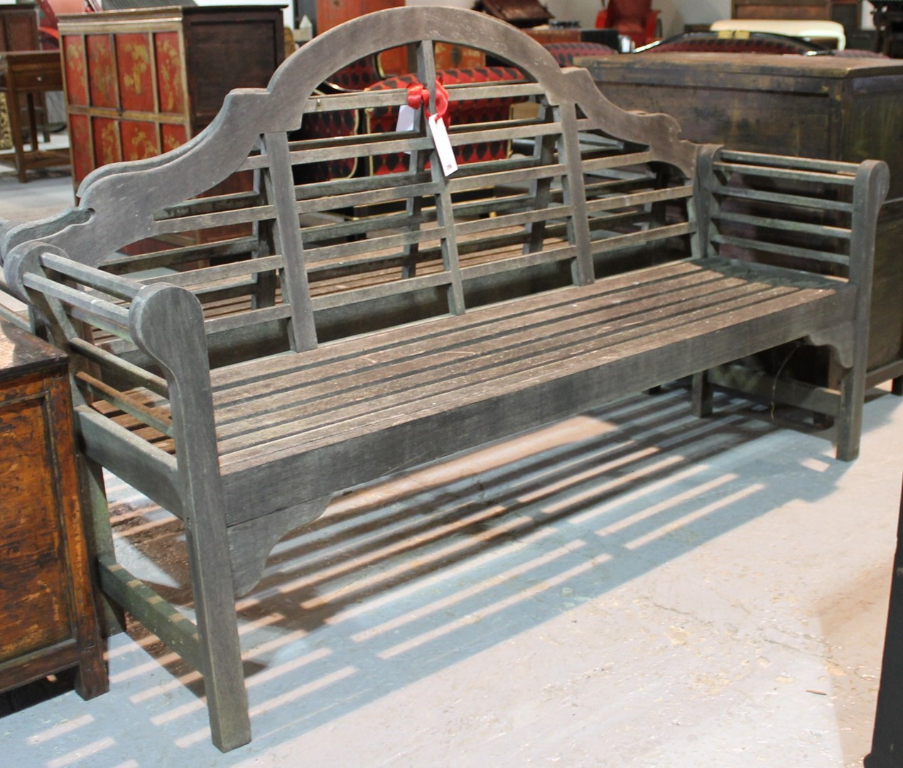 Appraisal: A Lutyens design hardwood garden bench cm wide