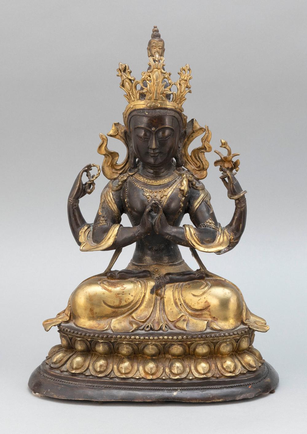 Appraisal: TIBETAN GILT-BRONZE FIGURE OF GREEN TARA GODDESS EARLY TH CENTURY