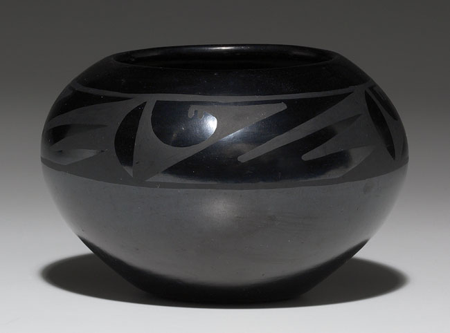 Appraisal: San Ildefonso olla highly polished finish with a black-on-black design