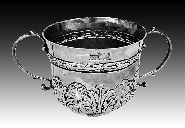 Appraisal: A LATE TH CENTURY SILVER TWO HANDLED CUP with chased