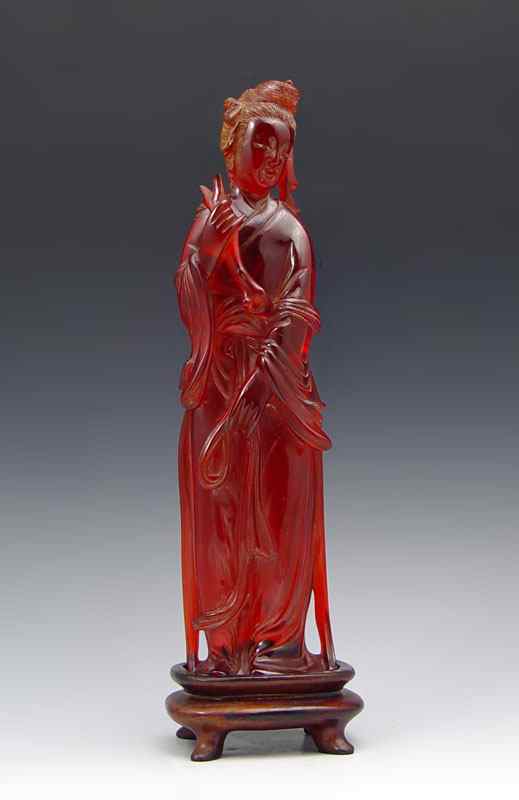 Appraisal: CHERRY AMBER QUAN YIN STAND '' tall The '' wood