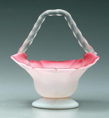 Appraisal: Satin glass basket cranberry with twisted frosted handle petal shaped