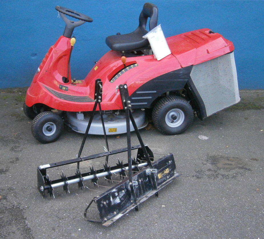 Appraisal: A Honda Hydro Static ride-on lawnmower with scarifier attachments