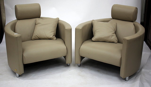 Appraisal: A LEATHER THREE-PIECE SUITE by Massot a sofa and two