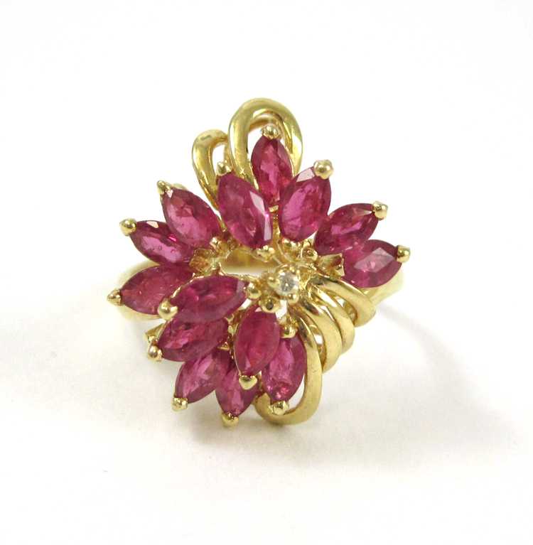 Appraisal: RUBY DIAMOND AND FOURTEEN KARAT GOLD CLUSTER RING set with