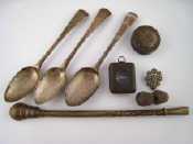 Appraisal: A mixed lot Three Georgian silver teaspoons a white metal