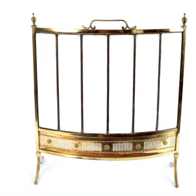 Appraisal: A brass and glass fire screen on splay feet the