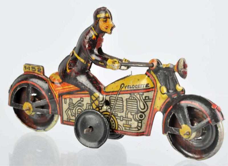 Appraisal: Tin Litho Motorcycle Penny Toy Spanish Marked Velocette on sides