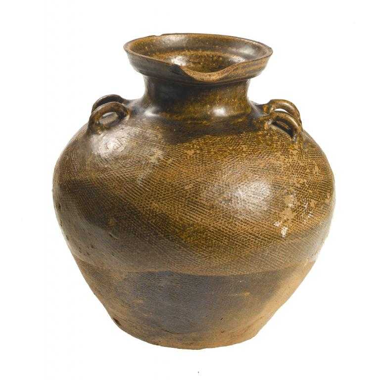 Appraisal: AN EARTHENWARE LIPPED OVIFORM JAR SHANG DYNASTY with twin loop