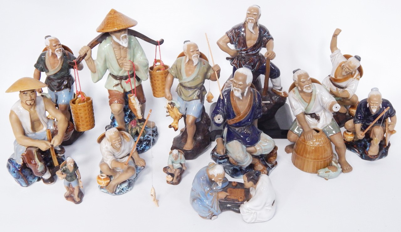 Appraisal: Chinese glazed and matt figures of fisherman a quantity