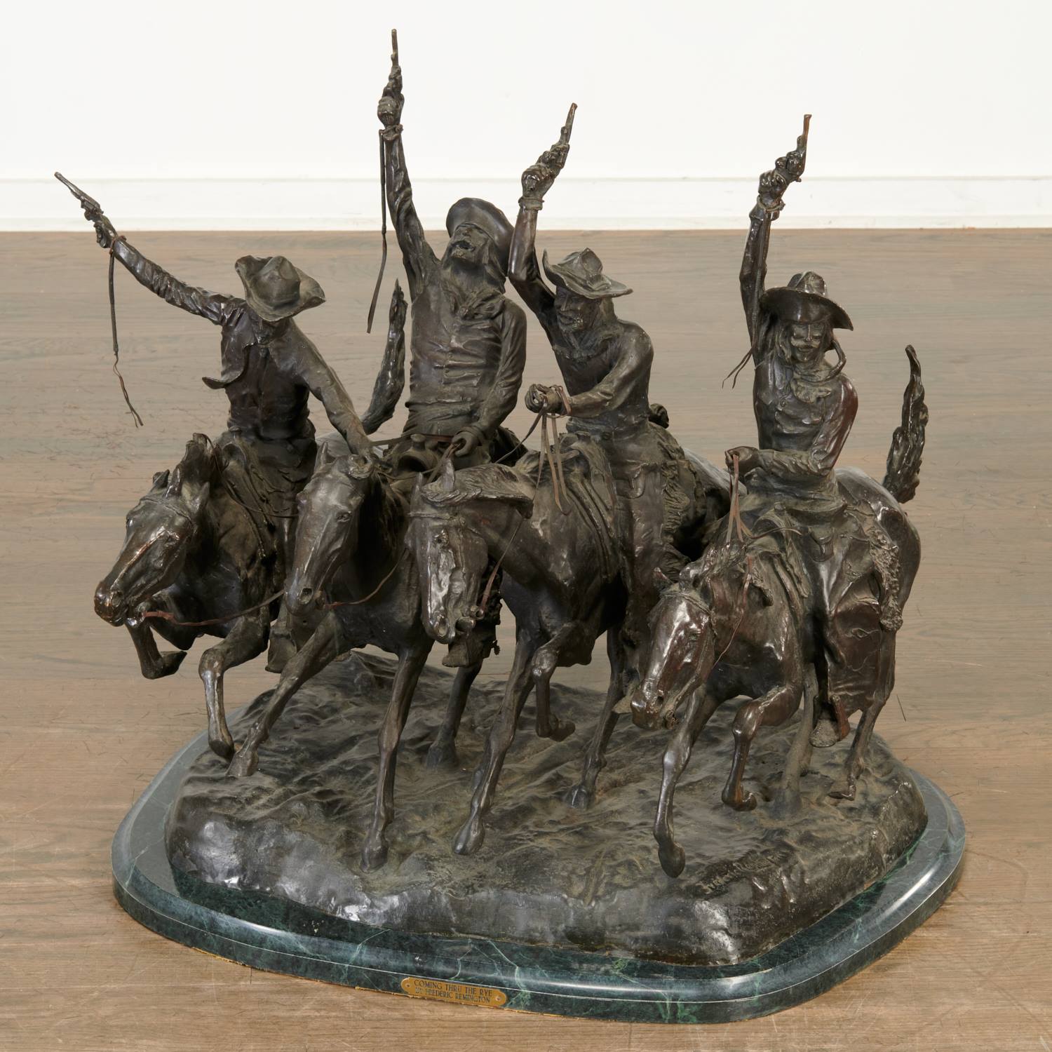 Appraisal: FREDERIC REMINGTON AFTER BRONZE FIGURAL GROUP After Frederic Remington American