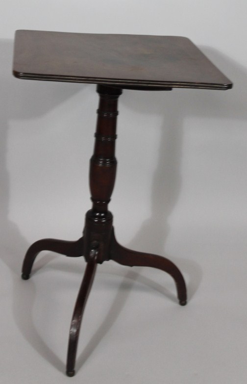 Appraisal: A Georgian mahogany tripod table with square snap top AF