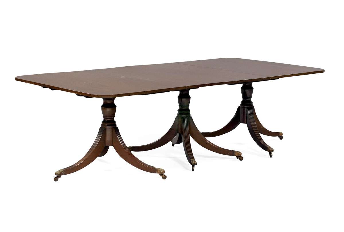 Appraisal: MAHOGANY TRIPLE PEDESTAL DINING TABLE IN THE STYLE OF DUNCAN