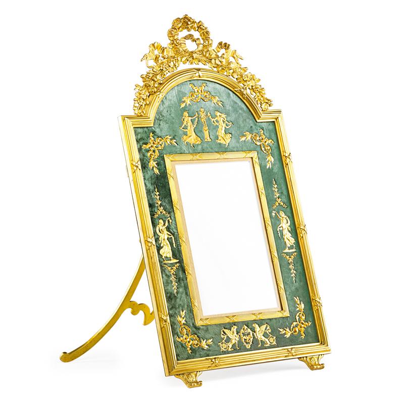 Appraisal: CLASSICAL GILT-BRONZE EASEL FRAME Classical gilt figures on velour ground