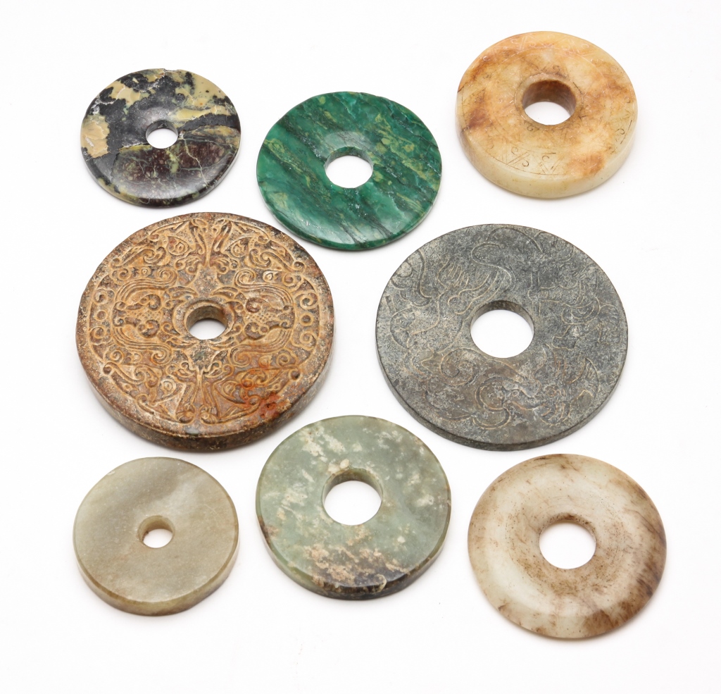 Appraisal: EIGHT ASIAN STONE DISKS Twentieth century or earlier Various stones