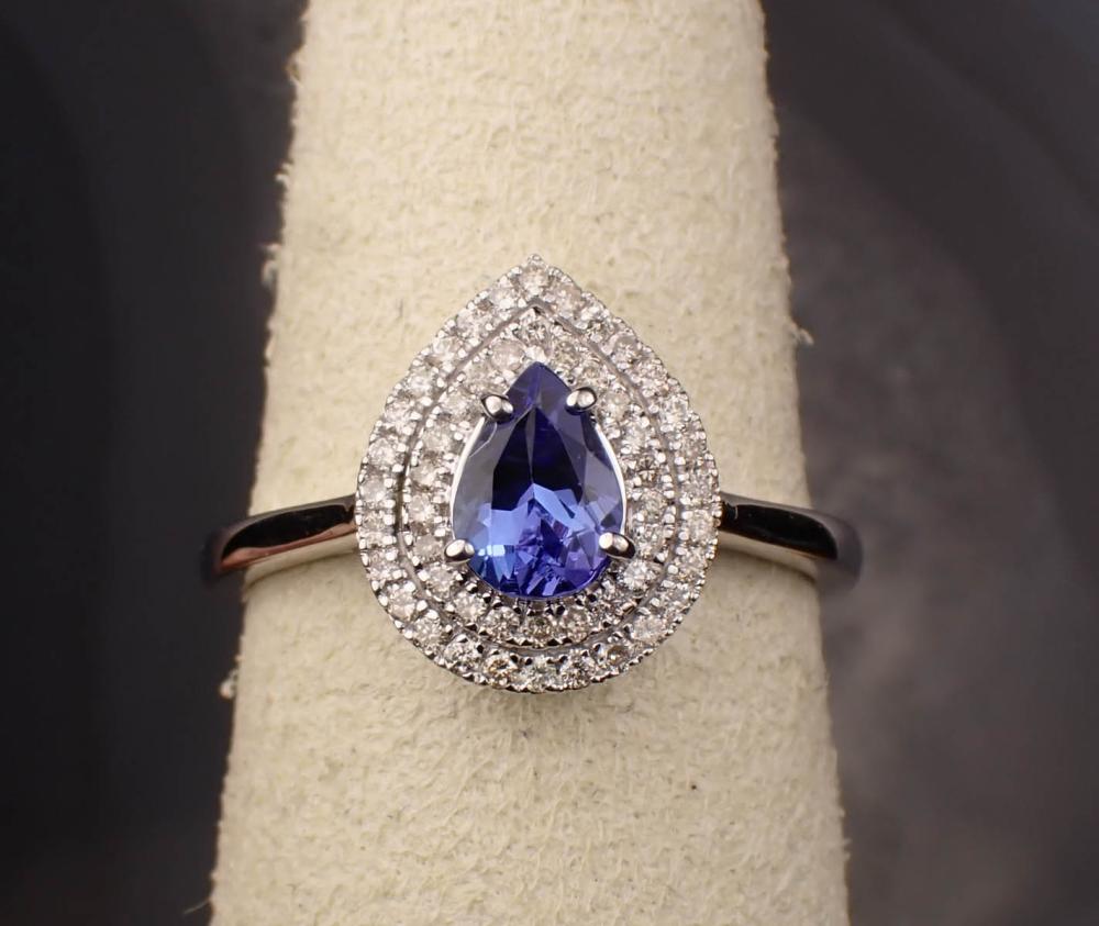 Appraisal: TANZANITE DIAMOND AND FOURTEEN KARAT GOLD RING The white gold