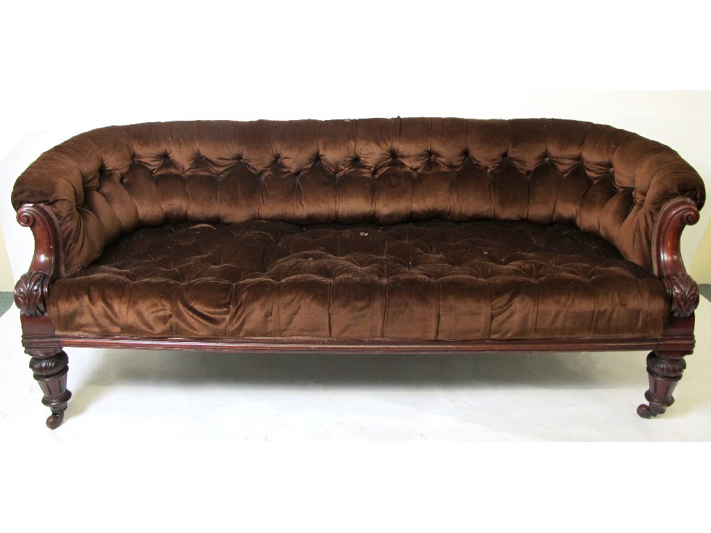 Appraisal: A Victorian mahogany buttonback settee with a pair of matching