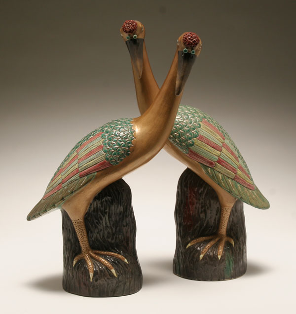 Appraisal: Pair Chinese enameled ceramic exotic birds metallic bodies adorned with