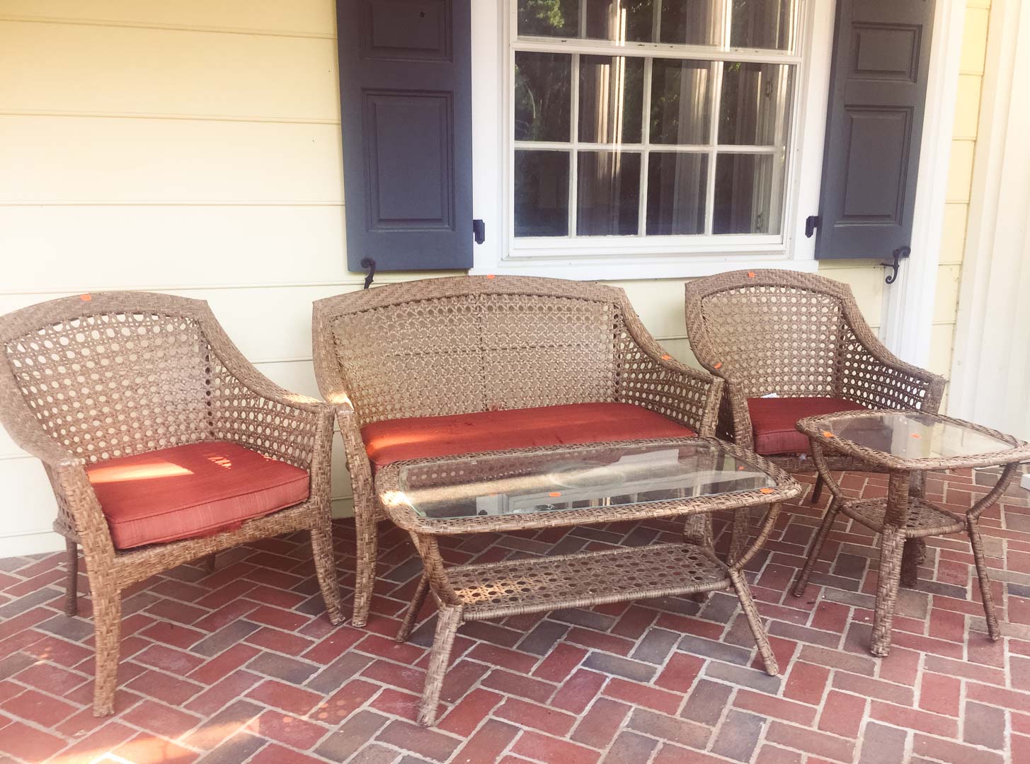 Appraisal: Five piece faux rattan woven plastic porch set including settee