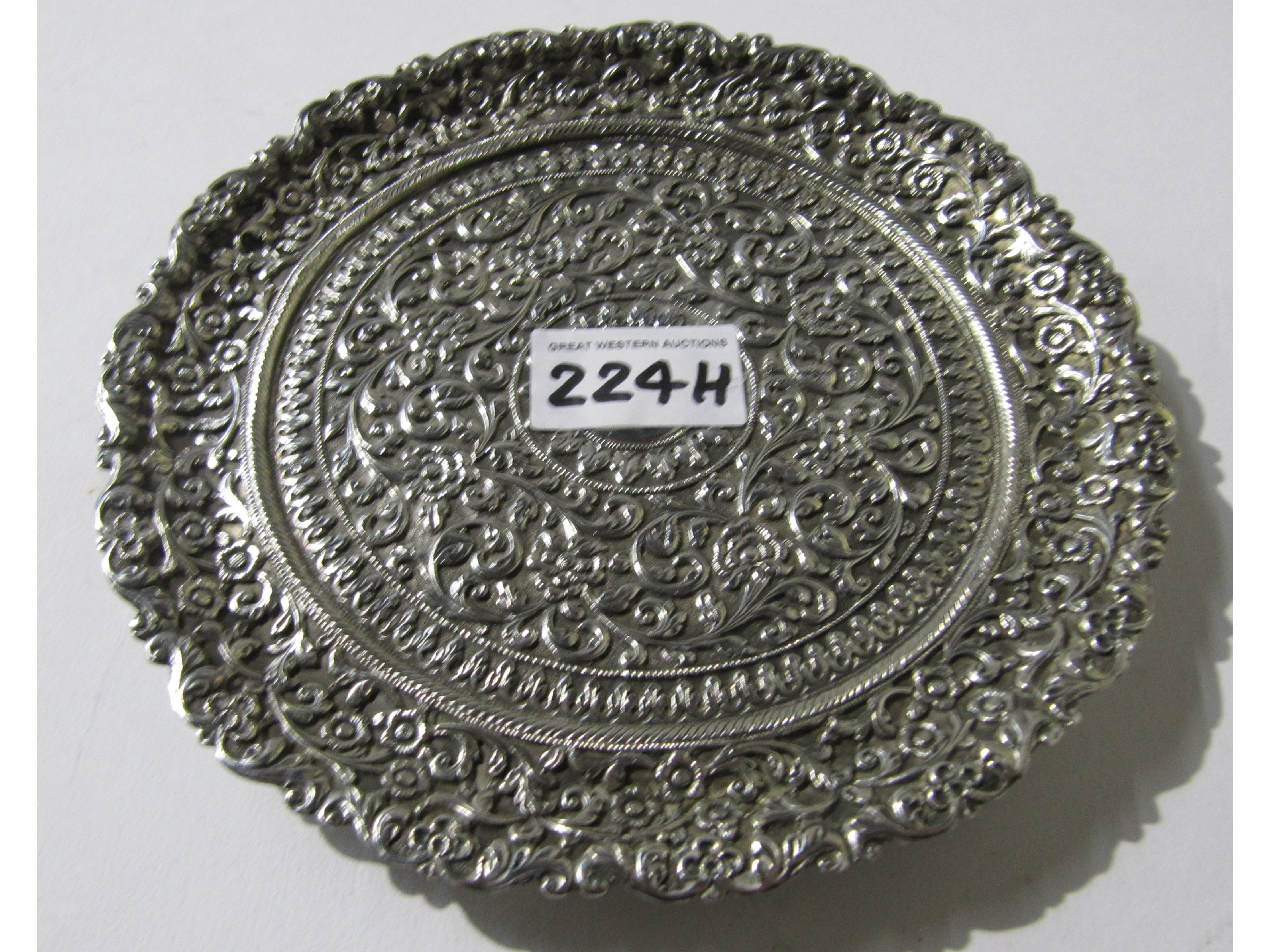 Appraisal: An Indian white metal plate