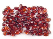 Appraisal: A quantity of loose polished garnets mixed cuts approx carats