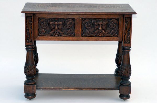 Appraisal: Library table Oak Top with bold skirt ornately carved with